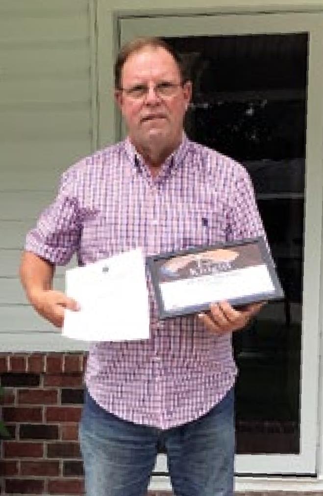 Dennis honored as July Knight of the Month