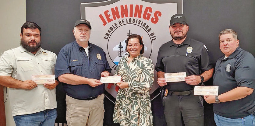 The Jeff Davis Parish District Attorney’s Office awarded the Jennings Police Department a $26,139.54 check, funds from property confiscation. District Attorney Lauren Heinen thanked the department for its dedication to interdiction and recognized the agency for seizing a total of $44,523 in drugs and asset forfeitures. Those present for the ceremony included Detective Eduardo Mendoza (from left) Chief Danny Semmes, Heinen, Lt. Ben Matte and Investigator Shelly Roberts. Submitted photo