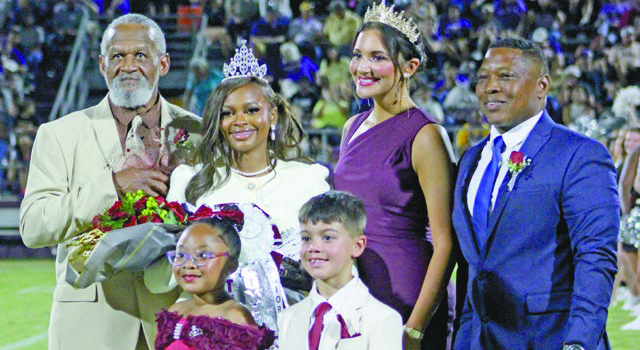 BULLDOG ROYALTY Jennings High School senior T’Niyha Withers was crowned the 2026 Bulldogs Homecoming Queen by previous royalty Adeline Oustalet Friday night. The celebration took place on the 50-yard line of Jerry Simmons Staduim when the Dogs took on the Iowa Yellow Jackets. Daily News photos by Wayne Bergeaux