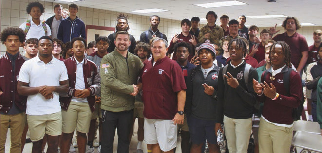 FOOTBA L L COACH OF T H E WEEK