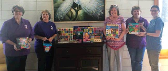 Volunteers send toys to West Behavioral