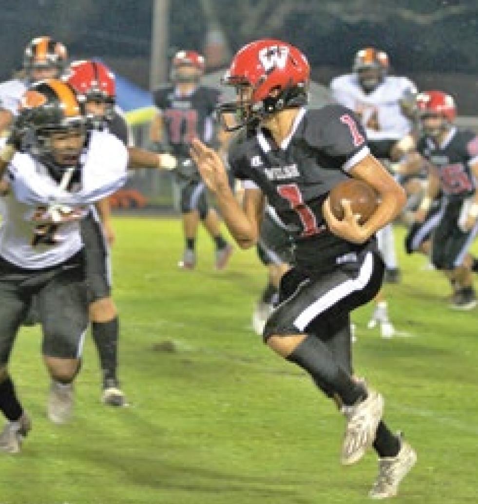 Hounds open district play at home against Pios