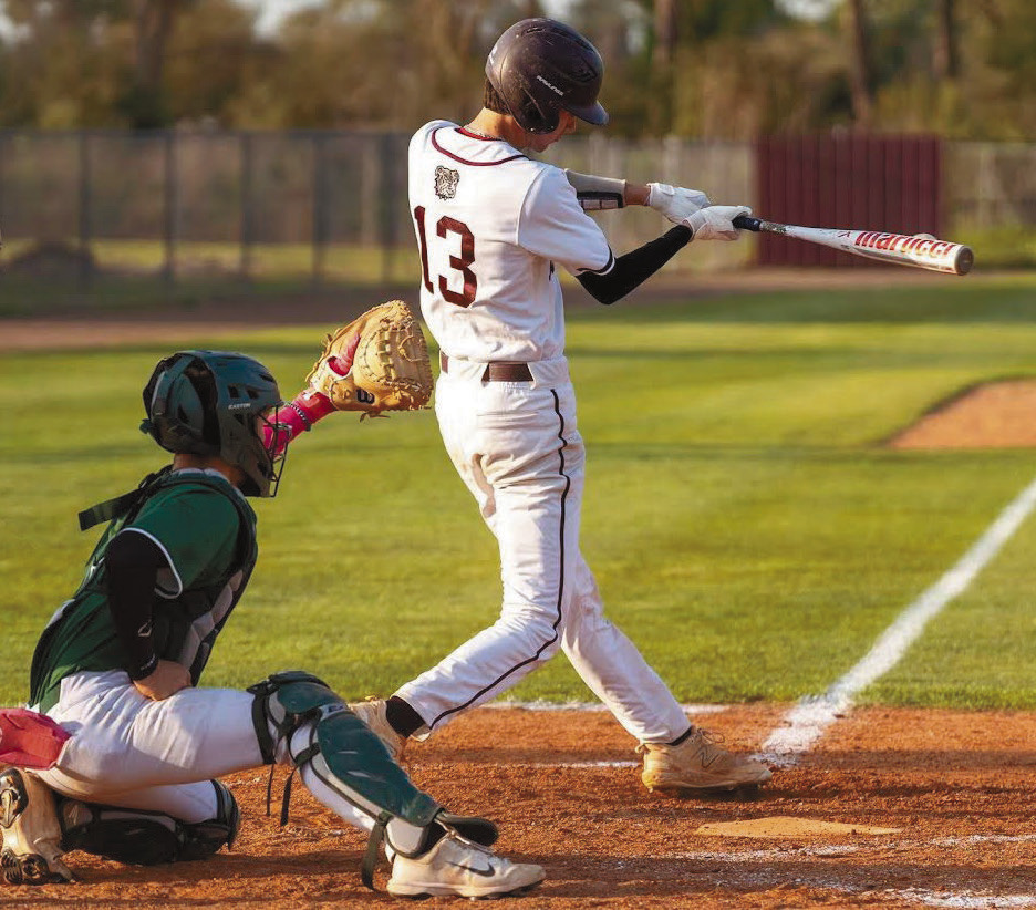 Dogs rally past Gents behind Hebert’s big blast