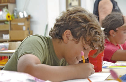 Deep in concentration, Caleb Chaisson composes a picture of apples. There are all new art projects scheduled for ZAM Summer Art Camp 2026. Daily News photos by Erin Hargrave