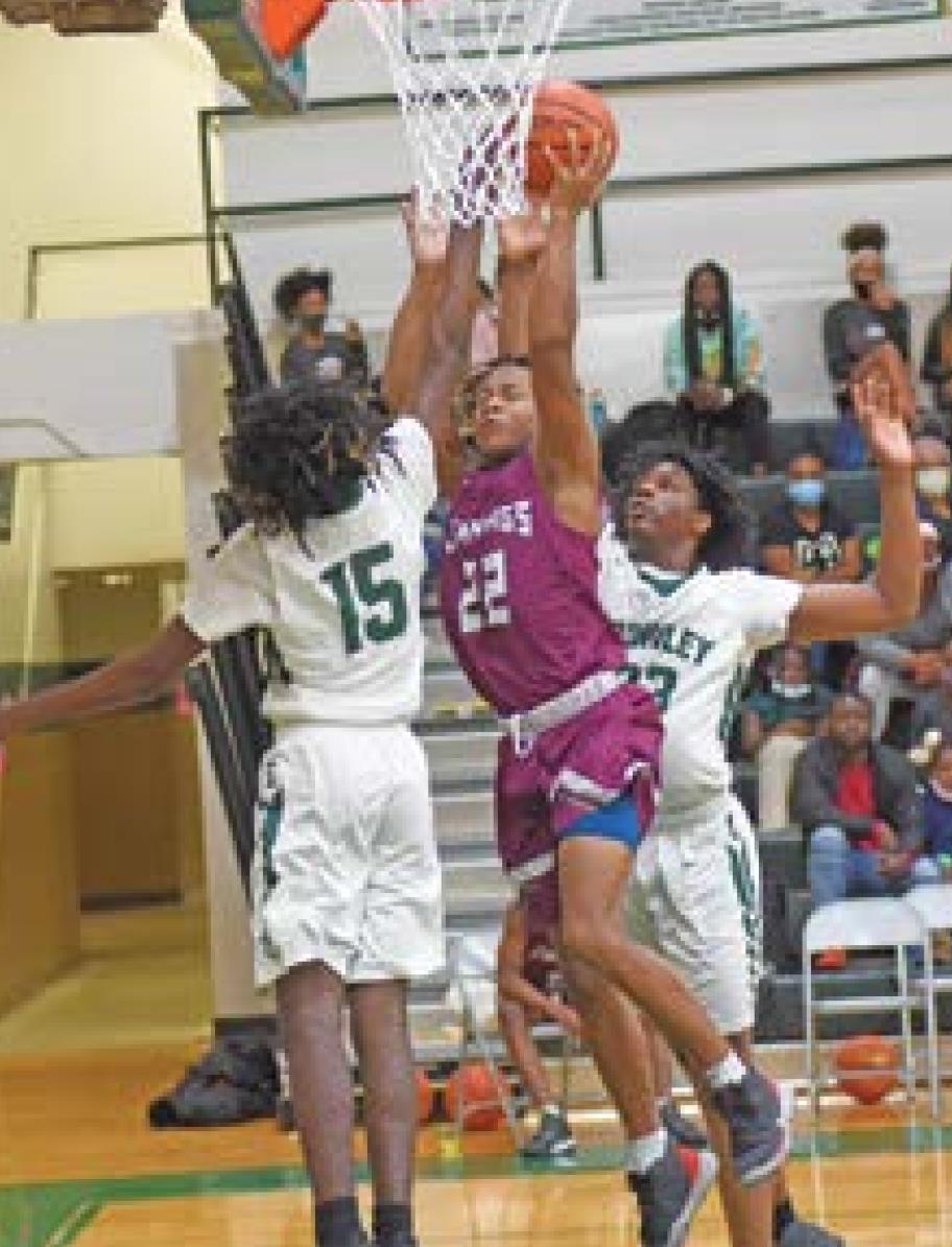 Dogs rally late to defeat Gents, 56-51