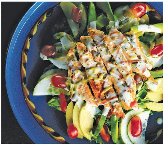 Top tender chicken with creamy dressing for light, refreshing meal