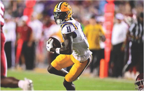 Late field goal powers No. 12 LSU past Arkansas, 34-31