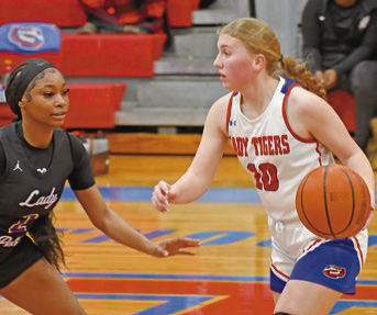 Lady Tigers advance