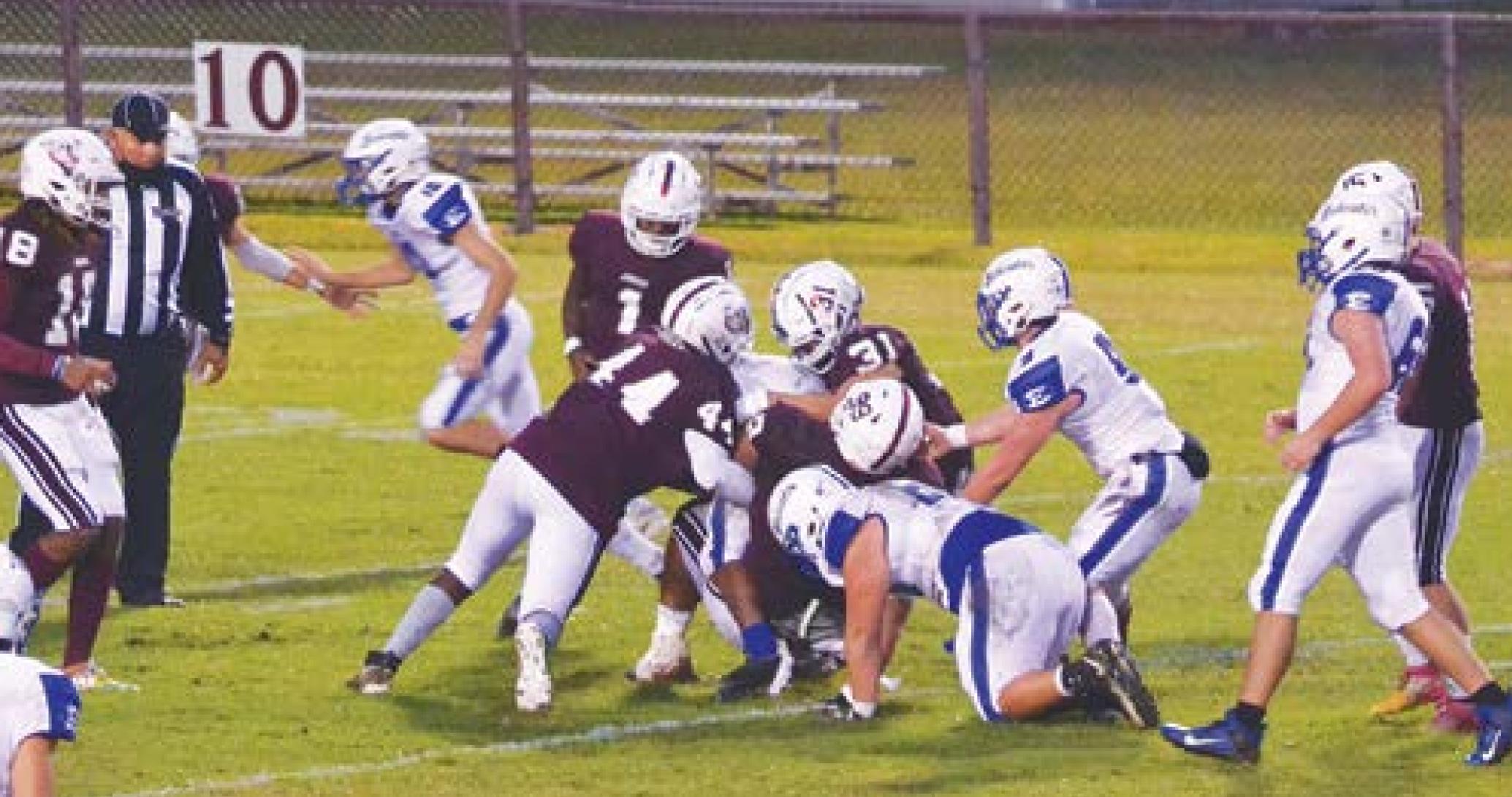 No. 1 Bulldogs take care of Erath on sloppy field
