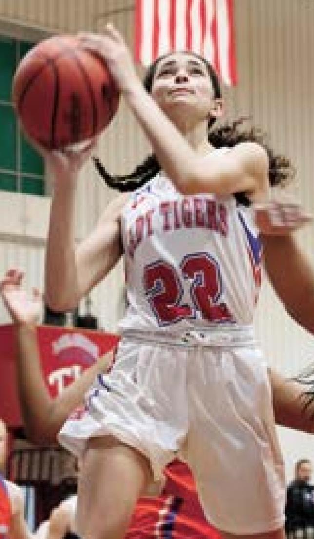 No. 4 Lady Tigers pull away from Delta Charter 63-30