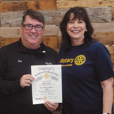 Rotary Club of Welsh inducts new member