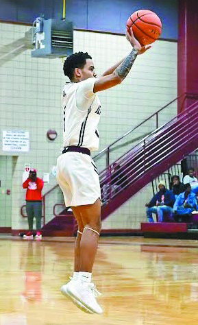 Dogs hang on for 56-42 win over Kinder