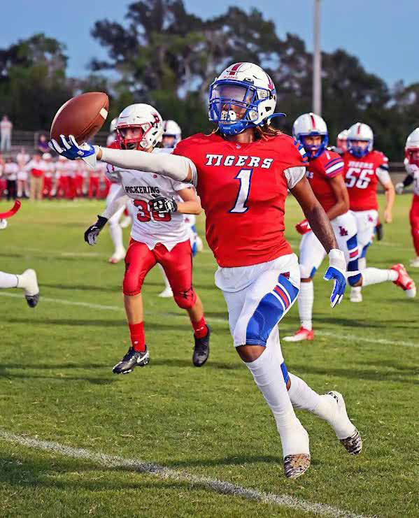 Tigers smash through Pickering, 56-7