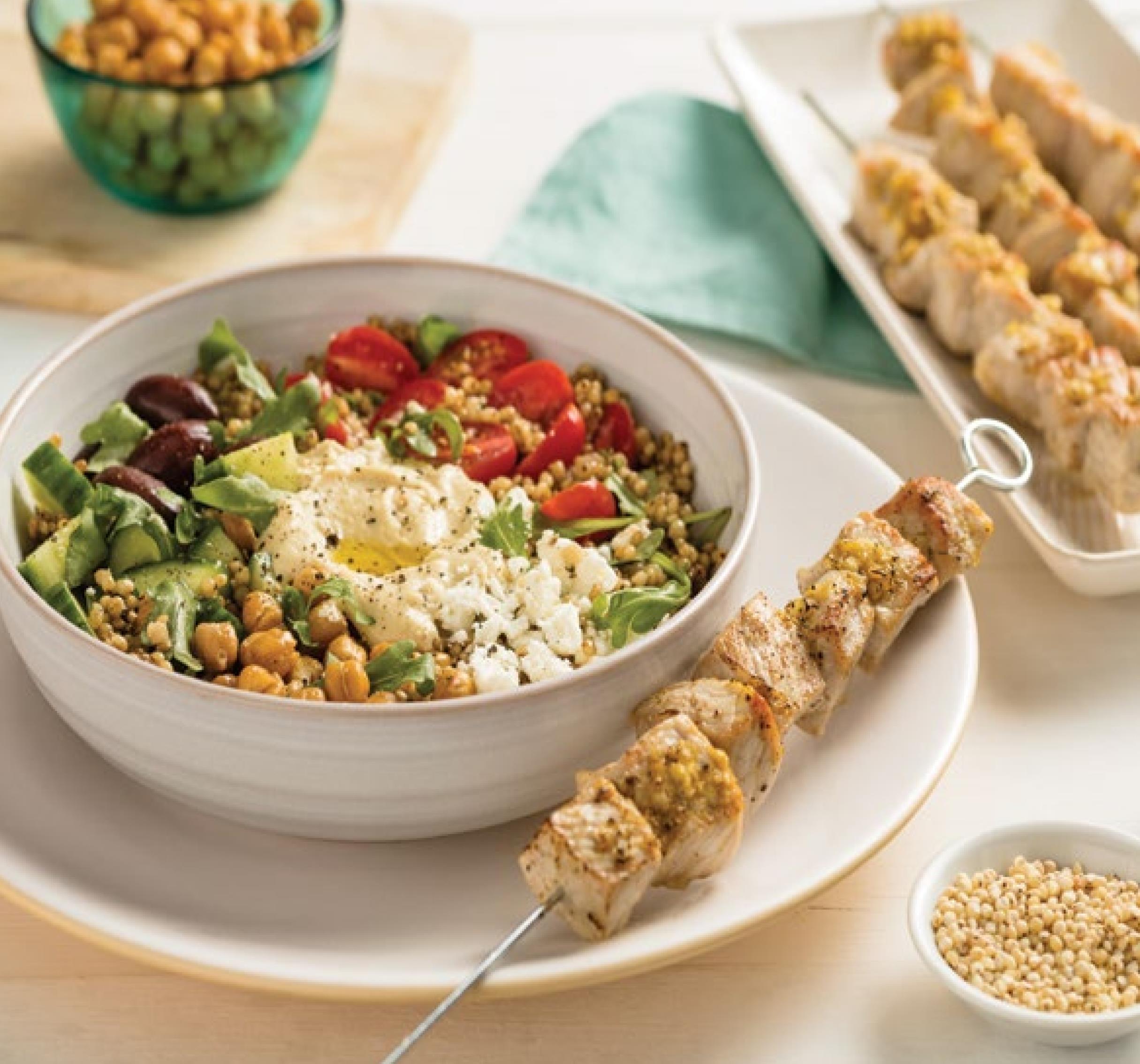 Mediterranean Grain Bowl with Pork Skewers