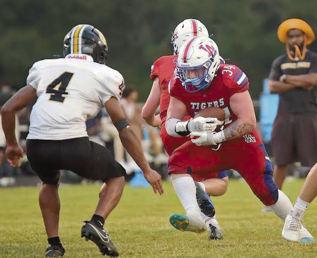 Tigers stave off Hornets 21-14 in jamboree action