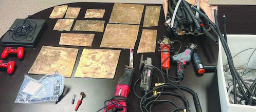 Four arrested in theft incident