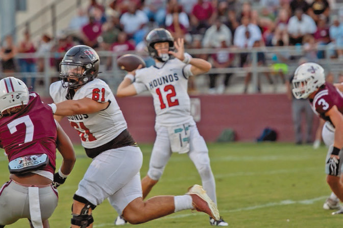 Hounds open district against Jackets