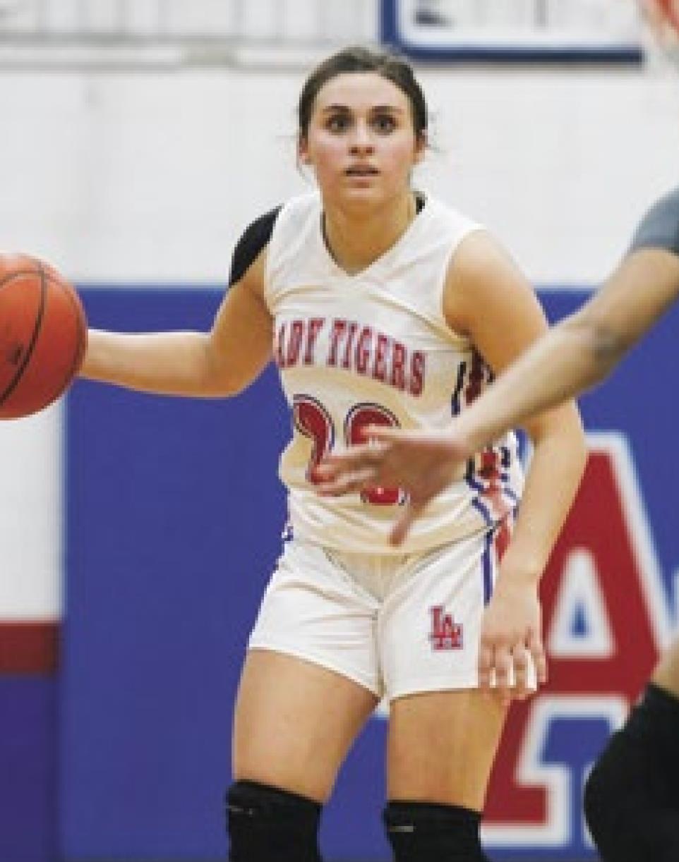 Lady Tigers chop