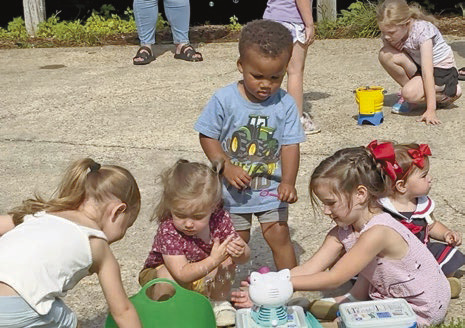 Alt Text for IAhead of the rainy forecast, Jeff Davis Parish Library held a bubble story time at Founder’s Park in Jennings. Children enjoyed sunshine, bubbles and a popping good time. Submitted photosmage