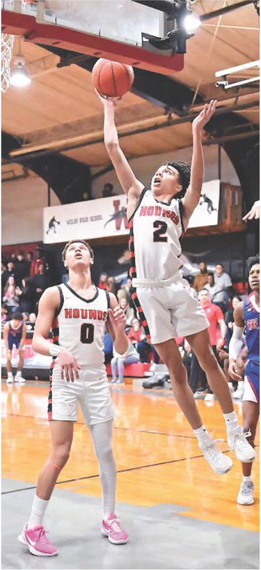 Hounds pound through Pios, 58-25