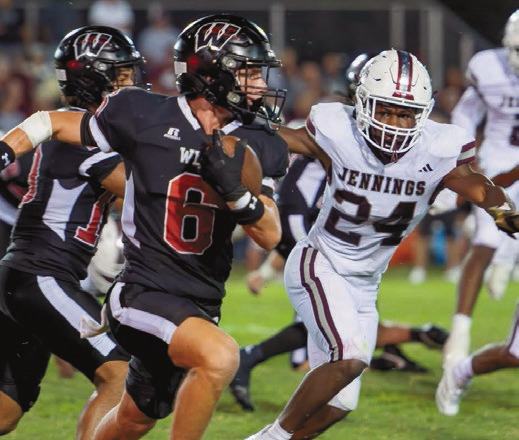 Jennings takes down rival Welsh, 26-14