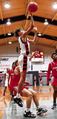 Hounds remain perfect in league play