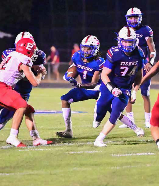 The Lake Arthur Tigers rallied for a 34-32 win over the Basile Bearcats Friday night at Jack Doland Stadium.