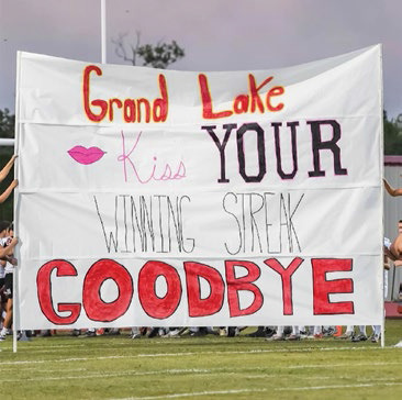 Hounds remain unbeaten with 43-7 destruction of Grand Lake