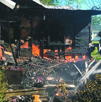 Firefighters tackle large house fire