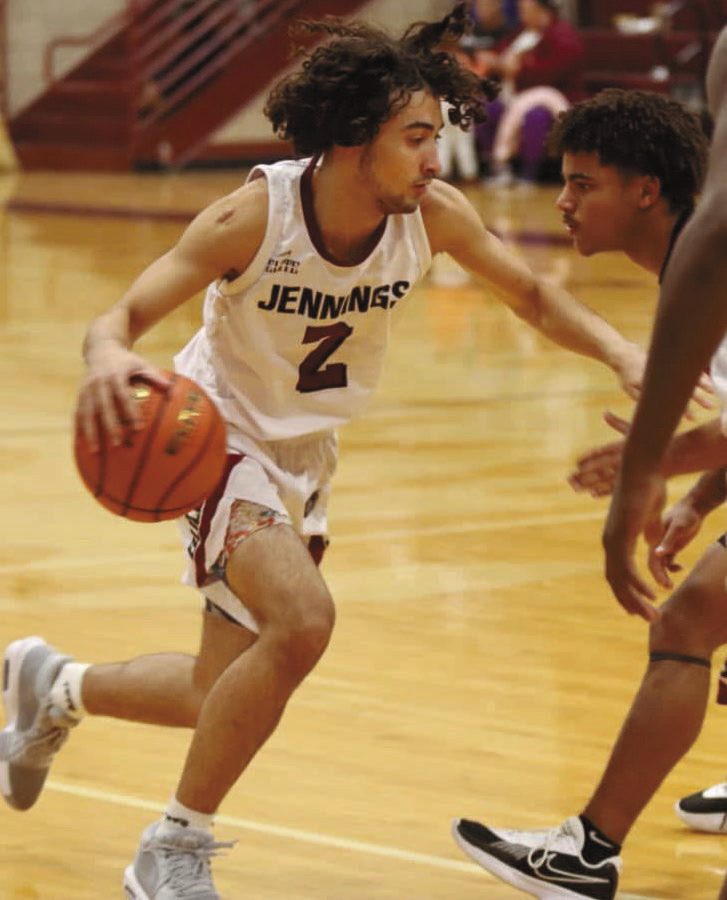 Dogs fall to Comeaux in hard-fought contest