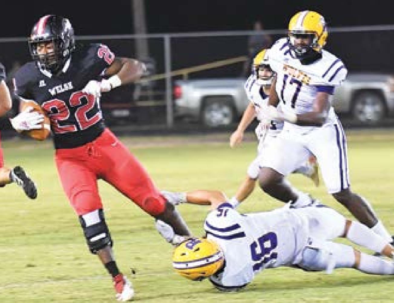 WOLVES TOPPLE HOUNDS 19-6