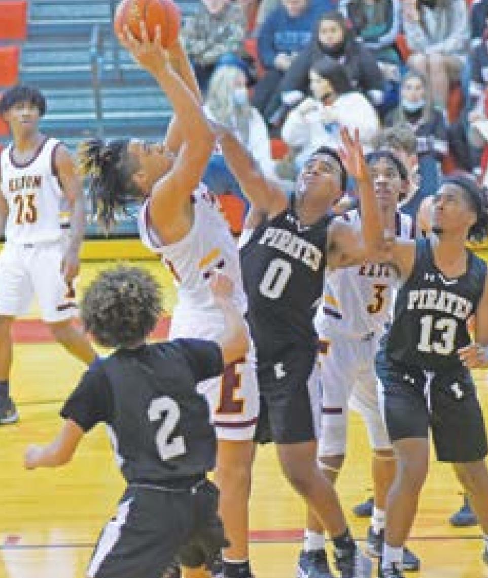 Elton drops Kaplan 61-31 in Midland Tourney