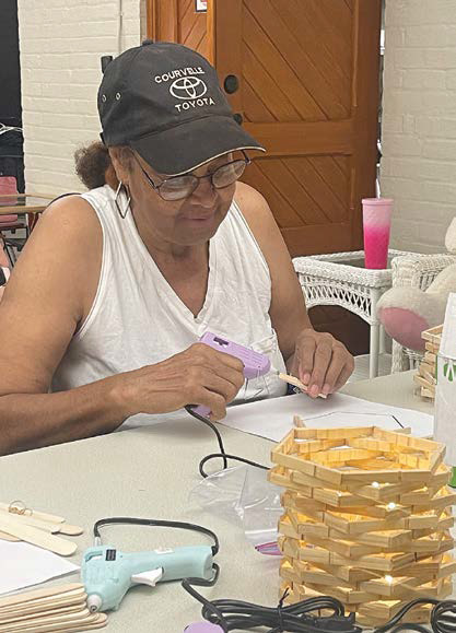Jeff Davis Parish Library Jennings branch held a crafting event recently. Parish residents, including Emma Anderson, came together to create cute wooden lanterns and enjoy friendly conversations.