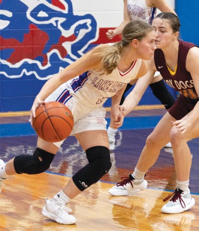 Lady Tigers club Bearcats, 63-11