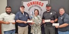 The Jeff Davis Parish District Attorney’s Office awarded the Jennings Police Department a $26,139.54 check, funds from property confiscation. District Attorney Lauren Heinen thanked the department for its dedication to interdiction and recognized the agency for seizing a total of $44,523 in drugs and asset forfeitures. Those present for the ceremony included Detective Eduardo Mendoza (from left) Chief Danny Semmes, Heinen, Lt. Ben Matte and Investigator Shelly Roberts. Submitted photo