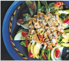 Top tender chicken with creamy dressing for light, refreshing meal
