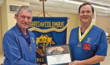 Grand Knight Mason LeJeune (left) and Knight of the Month Daniel Stretcher