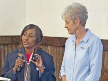 Assistant Gov. Phyllis Arceneaux (left) and Rotarian and President-Elect Bernadine Daboval