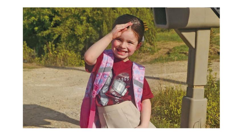 Arabella Istre, 4, eagerly scans the road for her school bus, excited to begin her very first day of school. Students filled parish schools Friday as the 2026-27 year kicked off in Jeff Davis Parish. Daily News photo by Erin Hargrave