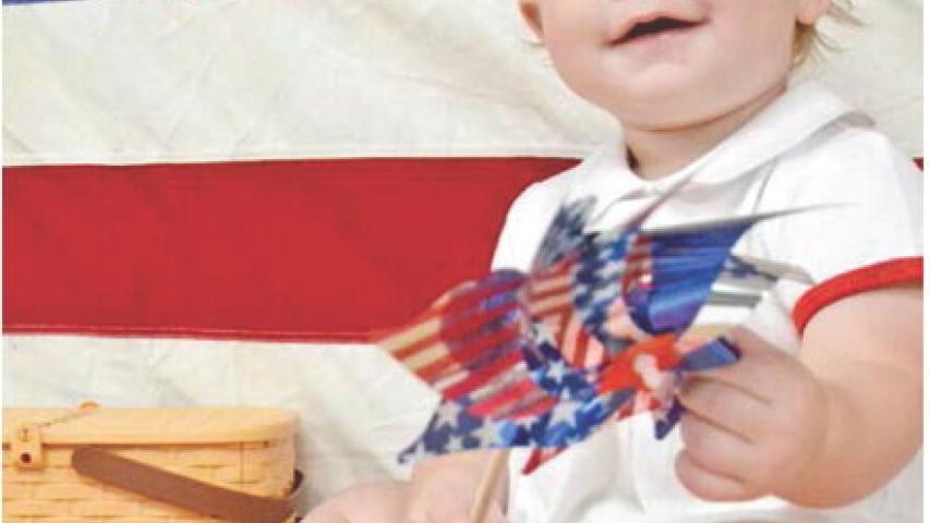 One-year-old Sonny Landry is all smiles as communities across the nation celebrate America’s 250th birthday. Sonny lives in Jennings with his parents Bailey and Kade Landry and sibling River. Daily News photo by Erin Hargrave